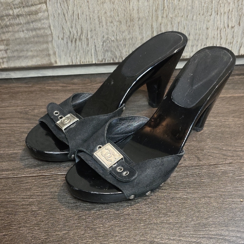 CHANEL Black Heeled Mules with Silver Accent